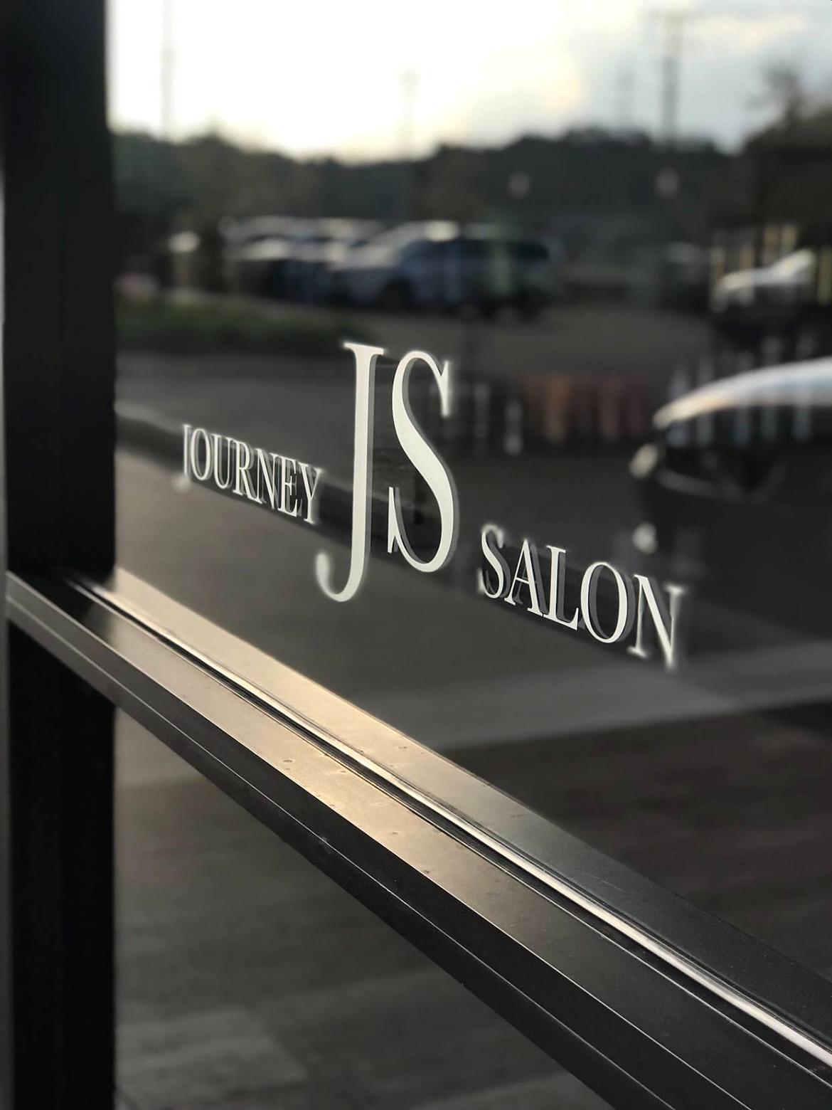 Journey Salon window logo in Clarkston, Michigan